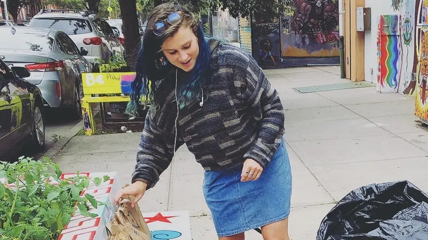 Food carrier picking up lunch bags